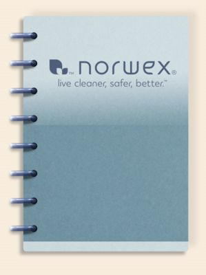 Norwex disc-bound journal with custom cover and lined pages.