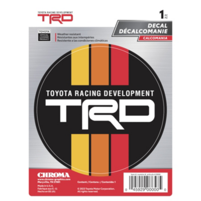 Circular decal sticker for Toyota Racing Development (TRD) with a black background, featuring the TRD logo in white and vertical stripes in red, orange, and yellow. 