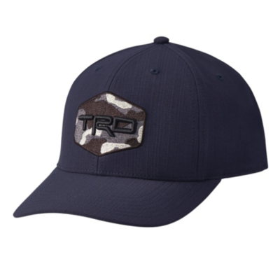  dark blue baseball cap with a curved brim. The front of the cap features a hexagonal patch with a camouflage pattern and the letters 'TRD' embroidered in black