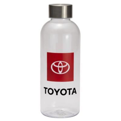 A clear plastic water bottle with a silver metal cap. The bottle features a red square logo with the Toyota emblem in white, and the word 'TOYOTA' in black below the logo