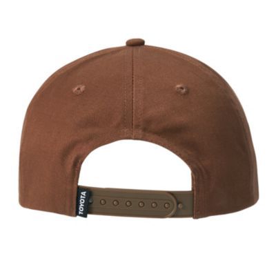 Back view of a brown baseball cap with a plastic adjustable strap and a small black tag on the left side displaying the word 'TOYOTA' in white letters.