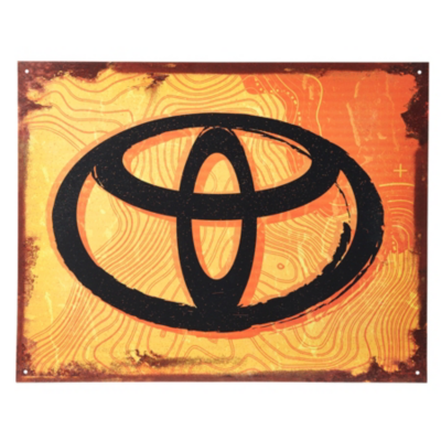 A vintage-style metal sign featuring the Toyota logo. The background is an orange and yellow gradient with a topographic map design