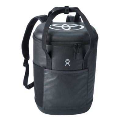Black backpack cooler with large white Toyota bug printed on top.