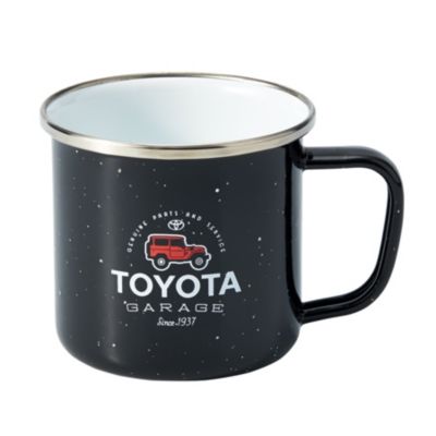 Black enamel speckeled mug with Toyota garage artwork printed on front