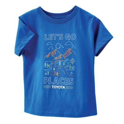 Blue kids' t-shirt featuring a graphic of a winding road through mountains, trees, and a river, with the text 'LET'S GO PLACES' and 'TOYOTA' printed above and below the illustration.