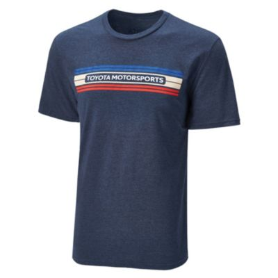 navy blue tee with Toyota Motorsports text printed on front in white. Aroudn the text is 3 different colored stripes, blue tan and red.