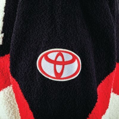 Left sleeve with white Toyota bug patch