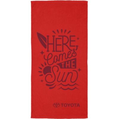 A rectangular, bright red towel with Toyota logo