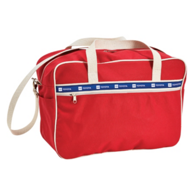 Red Heavyweight canvas bag with off white piping. Toyota logo printed in white on blue ribbon. Ribbon sewn above zipper on front. 19" W x 13" H x 8" D.