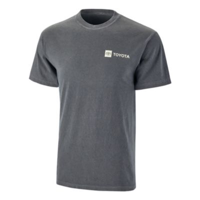 Dark grey tee with Toyota logo printed in cream on fleft chest.  Full color drive your dreams mountain logo printed on back of tee.