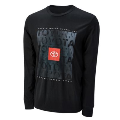 A black long-sleeve shirt with a front design featuring TOYOTA MOTOR SALES, USA, ESTABLISHED 1957, and the Toyota logo