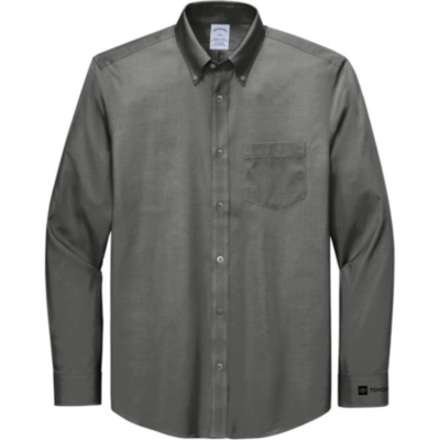 A long-sleeved, button-up dress shirt in a solid dark gray color. The shirt features a pointed collar, a single chest pocket on the left side, and buttons down the front. The cuffs are buttoned and Toyota logo in black on the left cuff