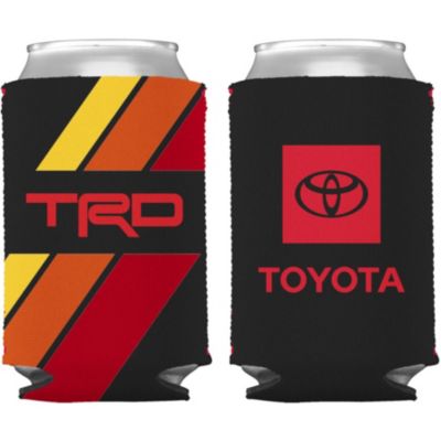 The image shows two black can coolers. The left cooler has diagonal stripes in yellow, orange, and red with the letters 'TRD' in red. The right cooler features a red square with the Toyota logo above the word 'TOYOTA' in red