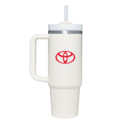 A white travel mug with a handle and a lid featuring a straw. The mug has the Toyota logo in red on the front