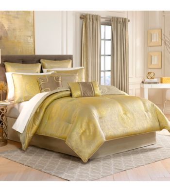Bedding with European styling and design by Croscill and Waterford.