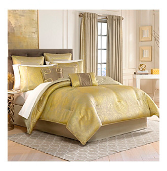 Bedding with European styling and design by Croscill and Waterford.