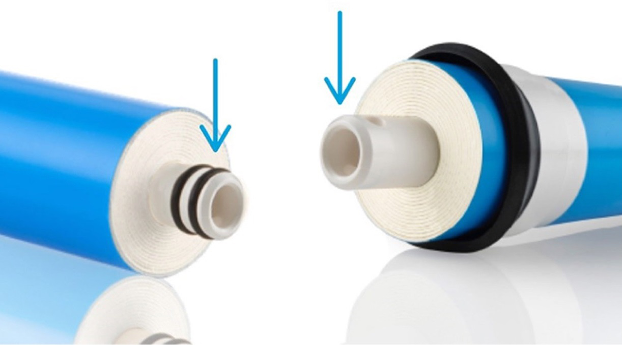 Close-up of a genuine FILMTEC™ reverse osmosis element's white-colored water tubes called out with blue arrows