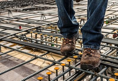 Lower body view of construction worker in a building site