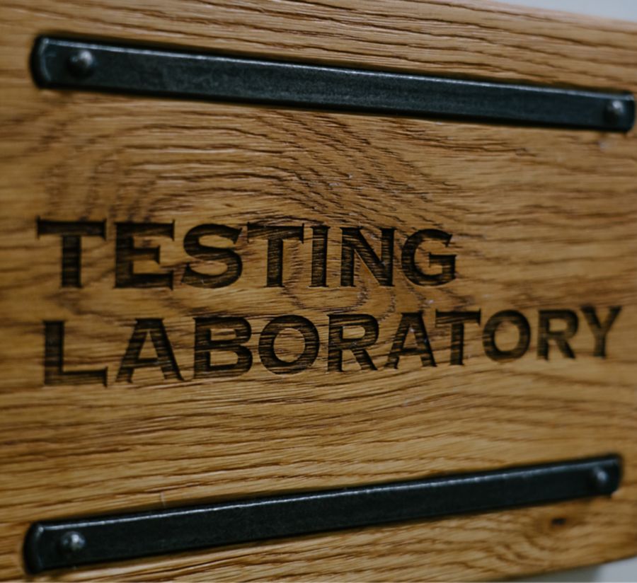 Wood sign saying Testing Laboratory