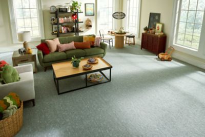 bedroom with leaf patterned carpet