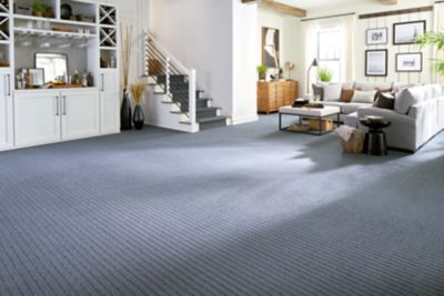 Living room with vibrant blue carpet