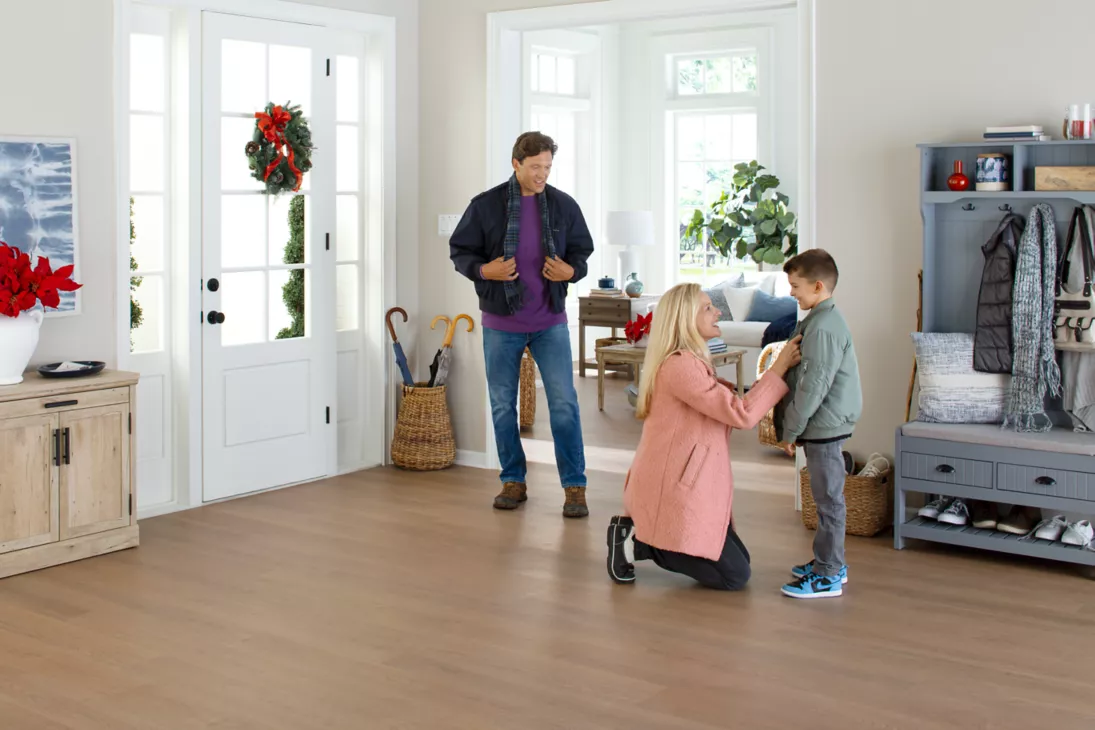 Family in foyer with SolidTech R flooring