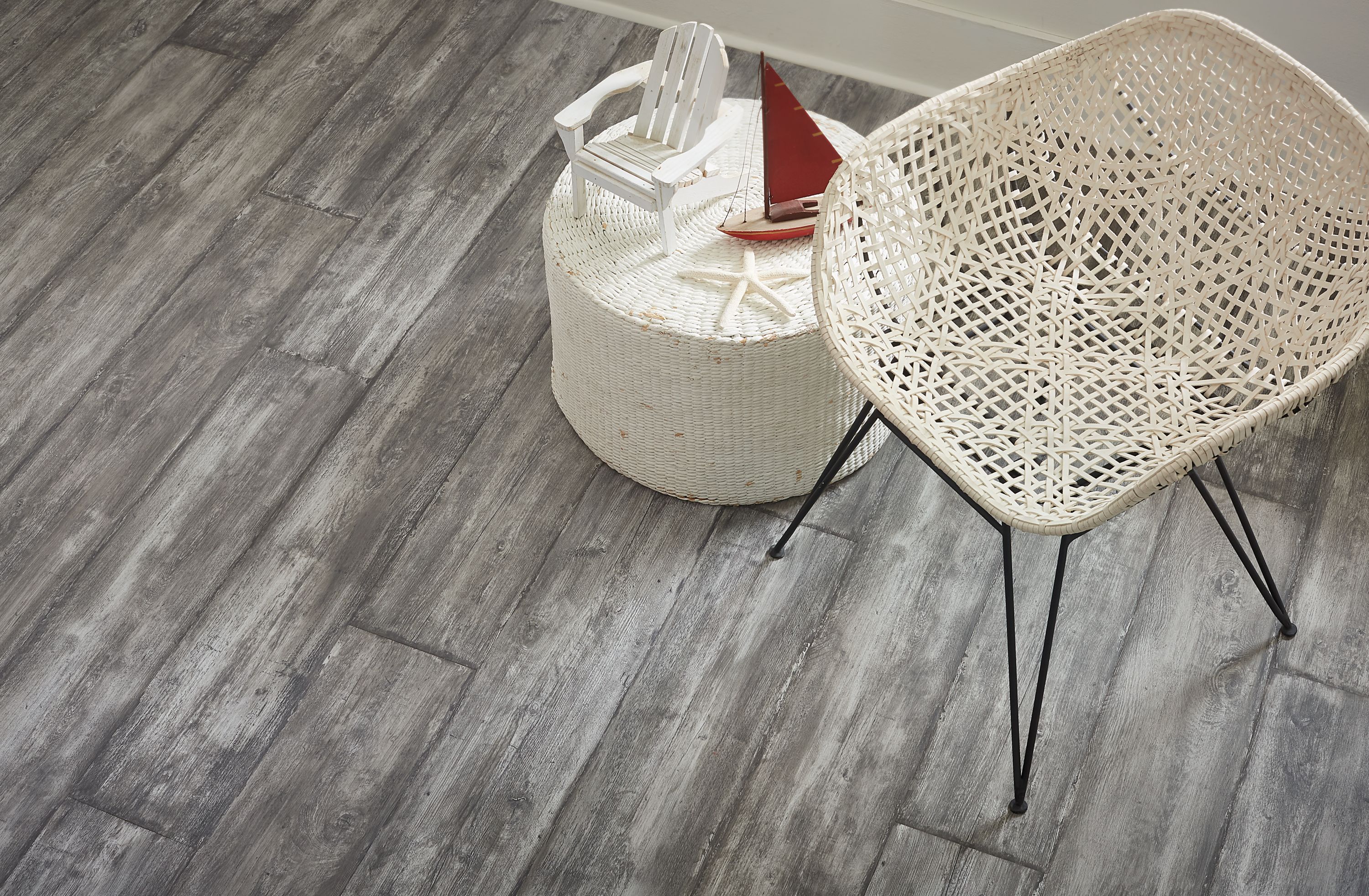 weathered grey laminate floors in coastal style home