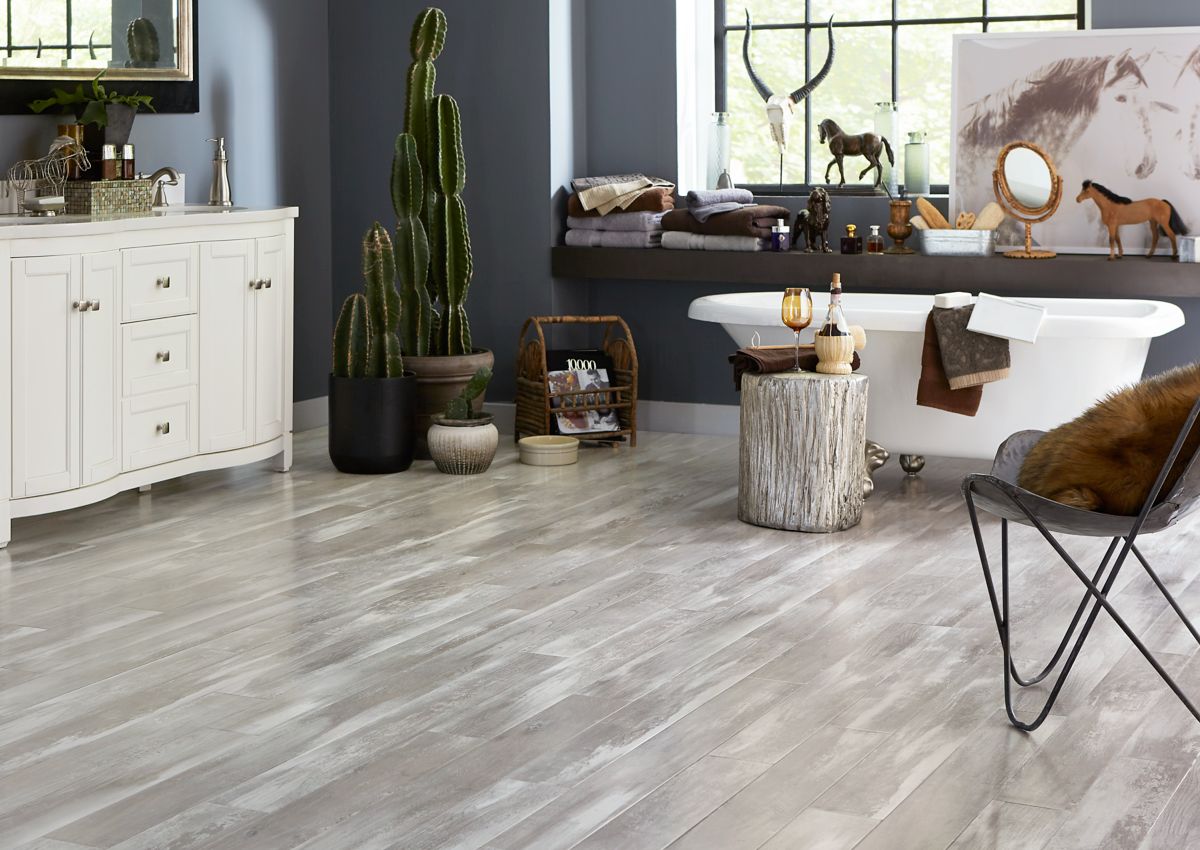 Bright hardwood floors in a rustic chic bathroom