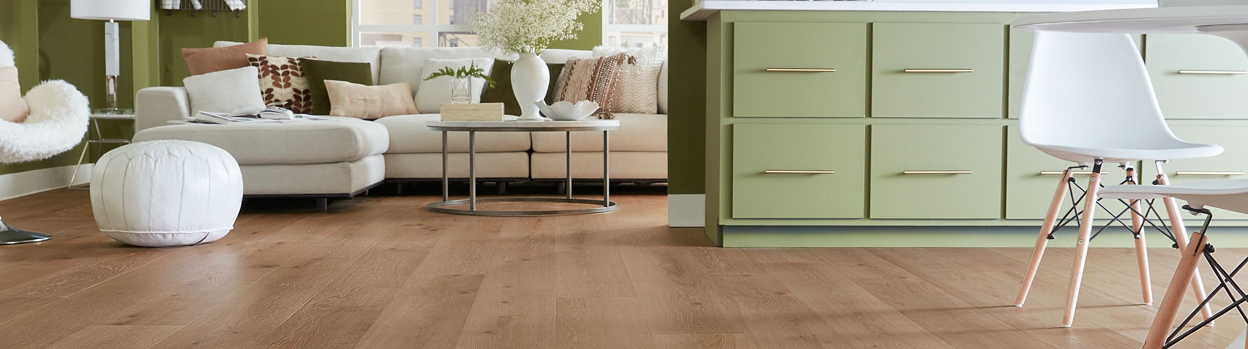 natural hardwood floors in green and white modern living room