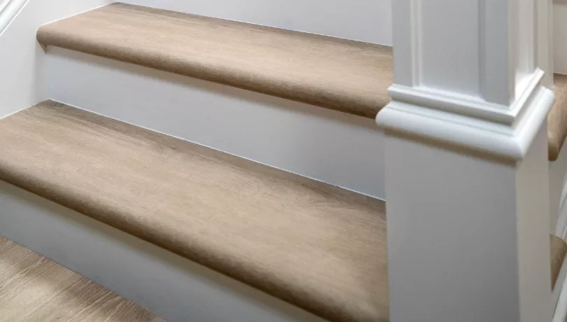 light brown stairs with rounded corners