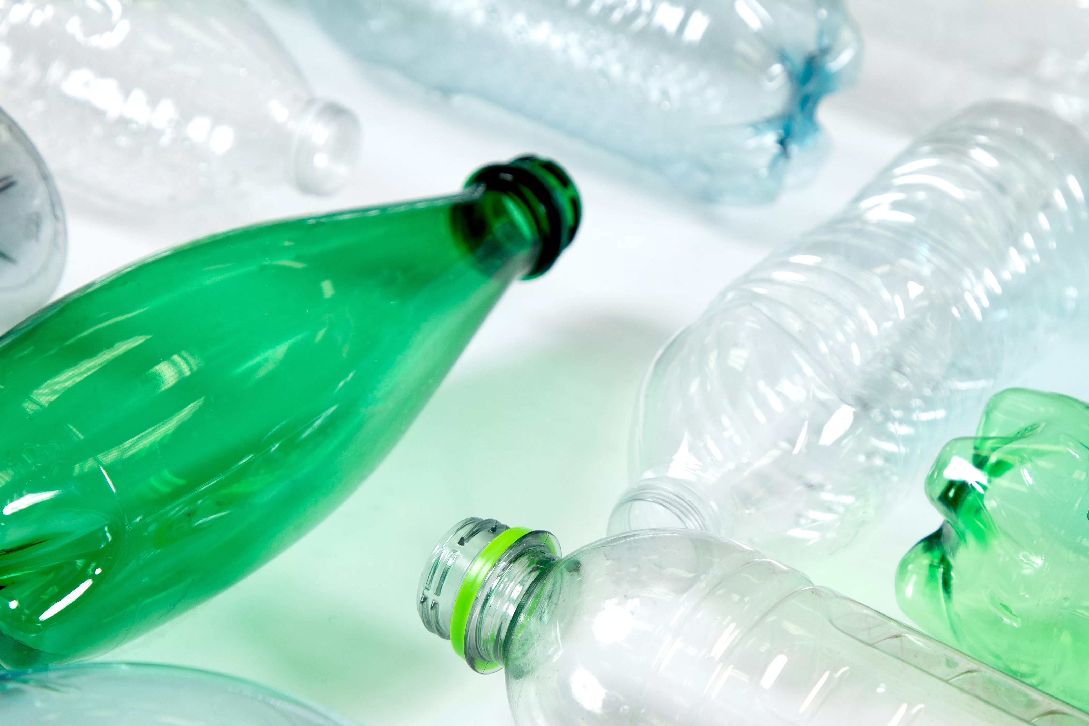 clear and green plastic bottles