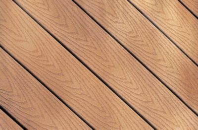 Wood grain pattern of Trex Accents composite decking in Saddle