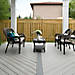 CFour columns anchor Trex decking in Cool Grey to enhance outdoor living in this deck design.