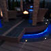This deck lighting idea from Trex features a backlit moat surrounding a cozy seating area.