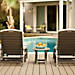 Trex Transcend-Terrassendielen in Gravel Path mit passenden Terrassenmöbeln bieten einen komfortablen Ort der Entspannung, wie bei 2013 HGTV Smart Home zu sehen ist.