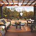 Lanterns suspended from a Trex pergola add visual interest to the classic decking combination seen in this deck design.