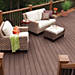 Traditional lines using Trex decking and railing are the perfect way to get a classic outdoor retreat.