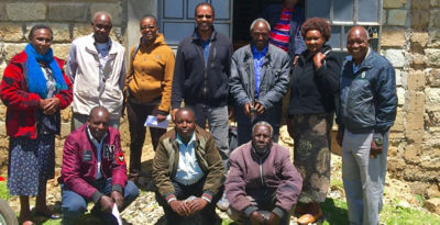 Quannambile Cooperative Leaders in front of their new storage and milling complex