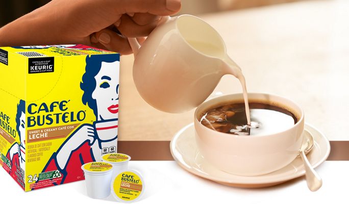 Café Bustelo Sweet & Creamy Café Con Leche K-cups next to a cup of coffee with cream being poured into it