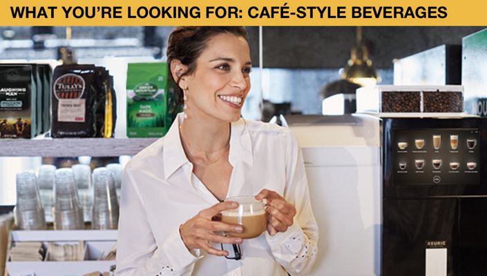 What you're looking for: Cafe-Style Beverages. Image of woman holding coffee and smiling.